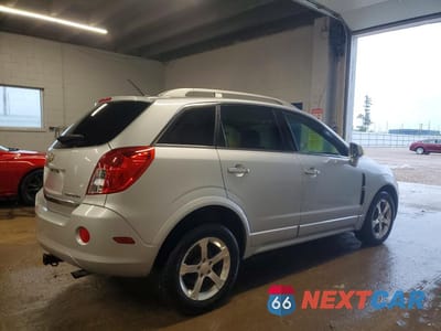 Trzecie zdjęcie samochodu z tyłu: 2014 CHEVROLET CAPTIVA LT VIN:3GNAL3EK7ES574481 - miniatura