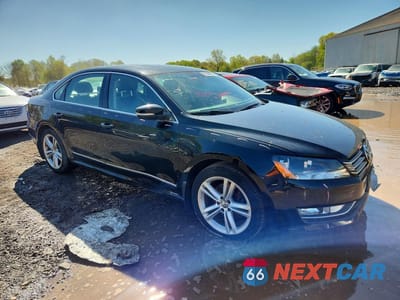 Czwarte zdjęcie samochodu z boku: 2015 VOLKSWAGEN PASSAT SE VIN:1VWBT7A32FC059847 - miniatura