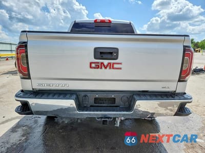 Zdjęcie 6 z 13 samochodu: 2017 GMC SIERRA K1500 SLT VIN:3GTU2NEC4HG164077 - miniatura