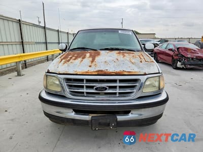 Piąte zdjęcie samochodu w środku: 1999 FORD F150 VIN:1FTRX17W9XKB78409 - miniatura
