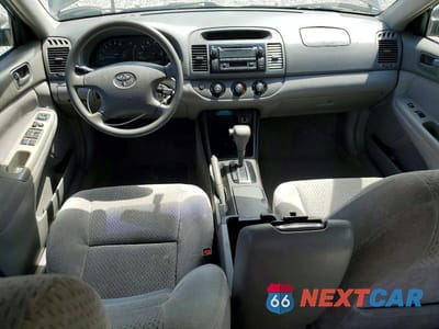 Zdjęcie 8 z 11 samochodu: 2003 TOYOTA CAMRY LE VIN:4T1BE32K13U704985 - miniatura