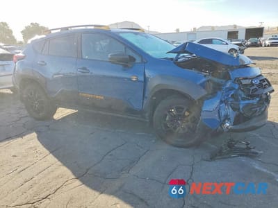 Czwarte zdjęcie samochodu z boku: 2024 SUBARU CROSSTREK WILDERNESS VIN:4S4GUHU68R3806269 - miniatura