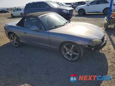 Czwarte zdjęcie samochodu z boku: 2004 MAZDA MX-5 MIATA SPEED VIN:JM1NB354740409387 - miniatura