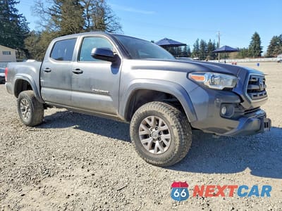 Czwarte zdjęcie samochodu z boku: 2017 TOYOTA TACOMA SR5 V6 VIN:3TMAZ5CN4HM042128 - miniatura