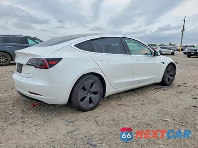 Trzecie zdjęcie samochodu z tyłu: 2020 TESLA MODEL 3 VIN:5YJ3E1EB8LF639621 - miniatura
