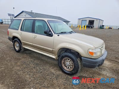 Czwarte zdjęcie samochodu z boku: 1999 FORD EXPLORER VIN:1FMZU34X8XUA27210 - miniatura