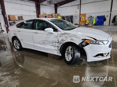 Czwarte zdjęcie samochodu z boku: 2018 FORD FUSION SE HYBRID VIN:3FA6P0LU0JR171956 - miniatura