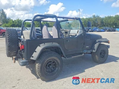 Trzecie zdjęcie samochodu z tyłu: 1997 JEEP WRANGLER / TJ SE VIN:1J4FY29P0VP438623 - miniatura