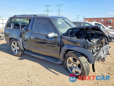 Czwarte zdjęcie samochodu z boku: 1997 CHEVROLET TAHOE K1500 VIN:3GNEK18R0VG131707 - miniatura