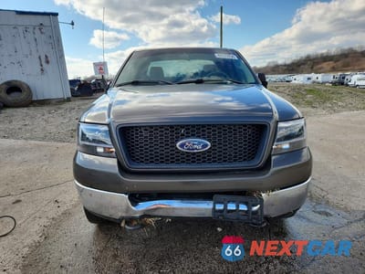 Piąte zdjęcie samochodu w środku: 2005 FORD F150 VIN:1FTPX14505FB65511 - miniatura