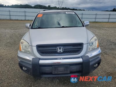 Piąte zdjęcie samochodu w środku: 2004 HONDA PILOT EX VIN:2HKYF18474H527332 - miniatura