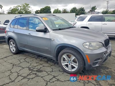Czwarte zdjęcie samochodu z boku: 2012 BMW X5 XDRIVE35D VIN:5UXZW0C57CL668098 - miniatura