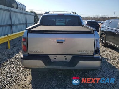 Zdjęcie 6 z 12 samochodu: 2014 HONDA RIDGELINE RTL-S VIN:5FPYK1F64EB014501 - miniatura