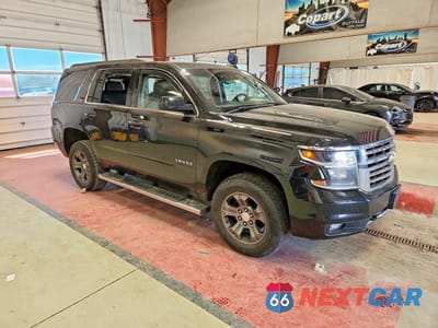 Czwarte zdjęcie samochodu z boku: 2016 CHEVROLET TAHOE K1500 LT VIN:1GNSKBKC8GR240268 - miniatura