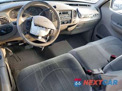 Zdjęcie 8 z 12 samochodu: 2001 FORD F150 VIN:1FTRX17L61NA33260 - miniatura