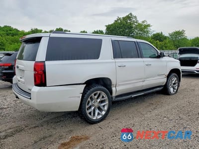 Trzecie zdjęcie samochodu z tyłu: 2020 CHEVROLET SUBURBAN K1500 PREMIER VIN:1GNSKJKC9LR238288 - miniatura