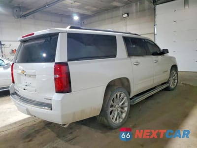 Trzecie zdjęcie samochodu z tyłu: 2019 CHEVROLET SUBURBAN K1500 PREMIER VIN:1GNSKJKJ7KR247018 - miniatura