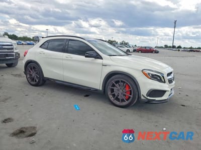 Czwarte zdjęcie samochodu z boku: 2015 MERCEDES-BENZ GLA 45 AMG VIN:WDDTG5CB1FJ062549 - miniatura
