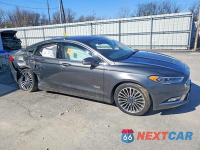Czwarte zdjęcie samochodu z boku: 2017 FORD FUSION TITANIUM PHEV VIN:3FA6P0SU1HR272239 - miniatura