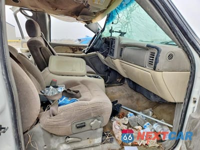 Zdjęcie 7 z 12 samochodu: 2002 CHEVROLET TAHOE C1500 VIN:1GNEC13V62J340235 - miniatura