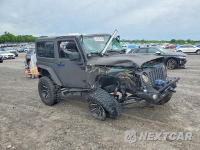 Czwarte zdjęcie samochodu z boku: 2016 JEEP WRANGLER SPORT VIN:1C4AJWAG1GL162518 - miniatura
