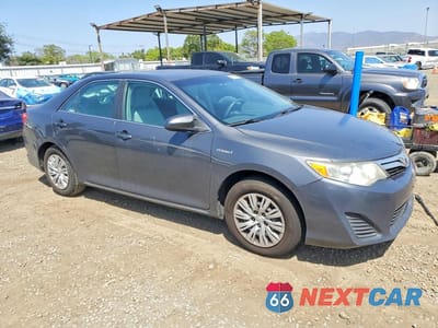 Czwarte zdjęcie samochodu z boku: 2012 TOYOTA CAMRY HYBRID LE VIN:4T1BD1FK7CU030231 - miniatura