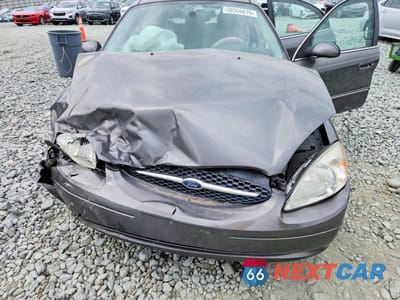 Zdjęcie 11 z 12 samochodu: 2003 FORD TAURUS SEL VIN:1FAFP59S83A234799 - miniatura