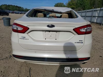 Zdjęcie 6 z 12 samochodu: 2013 FORD FUSION SE HYBRID VIN:3FA6P0LU6DR177250 - miniatura