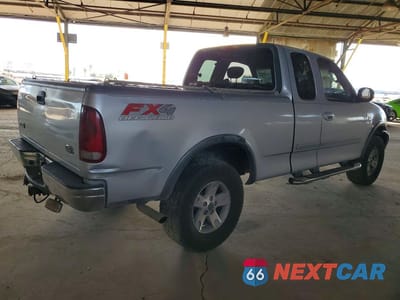 Trzecie zdjęcie samochodu z tyłu: 2003 FORD F150 VIN:1FTRX18L63NA20428 - miniatura