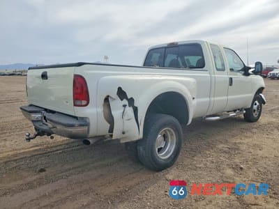 Trzecie zdjęcie samochodu z tyłu: 1999 FORD F350 SUPER DUTY VIN:1FTWX33F9XEA62386 - miniatura
