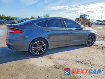 Trzecie zdjęcie samochodu z tyłu: 2020 FORD FUSION TITANIUM VIN:3FA6P0D93LR115278 - miniatura