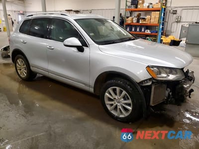 Czwarte zdjęcie samochodu z boku: 2013 VOLKSWAGEN TOUAREG V6 TDI VIN:WVGEP9BP3DD013285 - miniatura