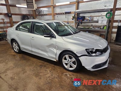 Czwarte zdjęcie samochodu z boku: 2011 VOLKSWAGEN JETTA TDI VIN:3VW3L7AJ7BM072184 - miniatura