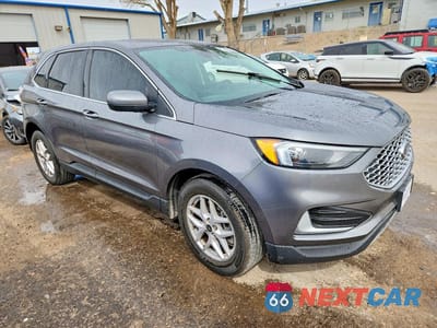 Czwarte zdjęcie samochodu z boku: 2023 FORD EDGE SEL VIN:2FMPK4J93PBA34421 - miniatura