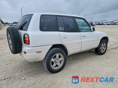 Trzecie zdjęcie samochodu z tyłu: 1999 TOYOTA RAV4 BASE VIN:JT3HP10V1X7137650 - miniatura