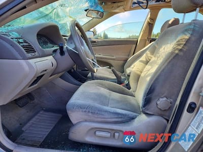 Zdjęcie 7 z 11 samochodu: 2002 TOYOTA CAMRY LE VIN:JTDBE32K220038195 - miniatura