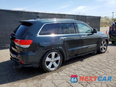 Trzecie zdjęcie samochodu z tyłu: 2014 JEEP GRAND CHEROKEE OVERLAND VIN:1C4RJFCG1EC178859 - miniatura