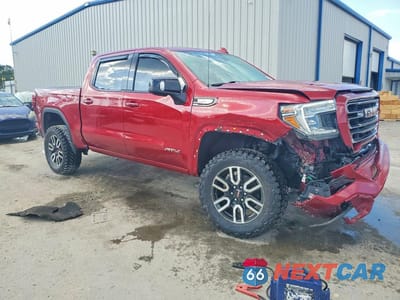 Czwarte zdjęcie samochodu z boku: 2019 GMC SIERRA K1500 AT4 VIN:3GTP9EEL2KG236622 - miniatura