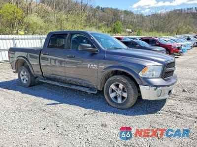Czwarte zdjęcie samochodu z boku: 2016 RAM 1500 SLT VIN:1C6RR7TT4GS416375 - miniatura