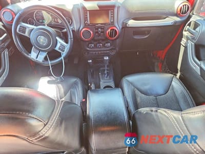 Zdjęcie 8 z 12 samochodu: 2014 JEEP WRANGLER UNLIMITED SPORT VIN:1C4BJWDG6EL198539 - miniatura