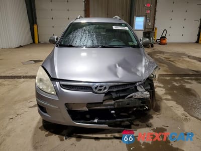 Piąte zdjęcie samochodu w środku: 2011 HYUNDAI ELANTRA TOURING GLS VIN:KMHDC8AEXBU108036 - miniatura