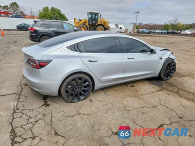 Trzecie zdjęcie samochodu z tyłu: 2018 TESLA MODEL 3 VIN:5YJ3E1EB3JF116861 - miniatura