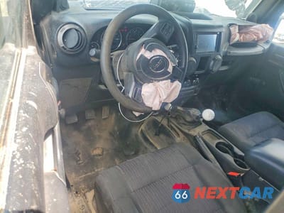 Zdjęcie 8 z 13 samochodu: 2012 JEEP WRANGLER SPORT VIN:1C4AJWAG9CL256351 - miniatura