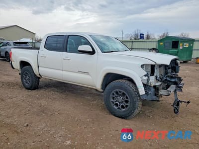 Czwarte zdjęcie samochodu z boku: 2017 TOYOTA TACOMA SR5 V6 VIN:3TMCZ5AN6HM120873 - miniatura