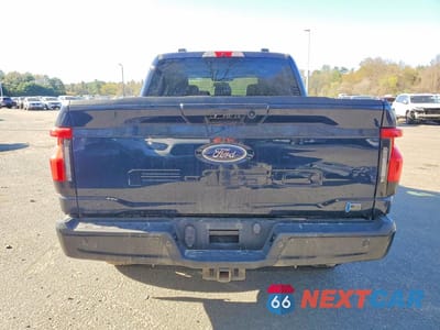 Zdjęcie 6 z 13 samochodu: 2023 FORD F150 LIGHTNING PRO VIN:1FT6W1EV9PWG42582 - miniatura