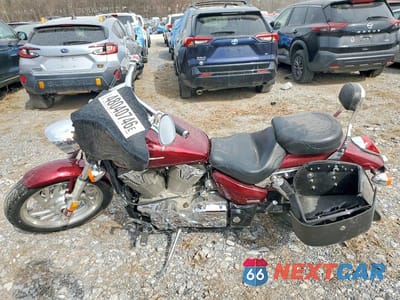 Trzecie zdjęcie samochodu z tyłu: 2006 HONDA VTX1300 C VIN:1HFSC55096A213849 - miniatura