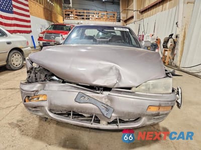 Piąte zdjęcie samochodu w środku: 1995 TOYOTA CAMRY LE VIN:JT2SK12EXS0312579 - miniatura