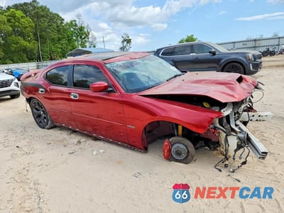 Czwarte zdjęcie samochodu z boku: 2006 DODGE CHARGER SRT-8 VIN:2B3LA73W86H338108 - miniatura