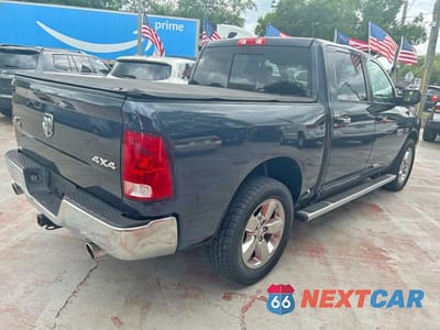 Czwarte zdjęcie samochodu z boku: 2014 RAM 1500 SLT VIN:1C6RR7LT0ES470446 - miniatura