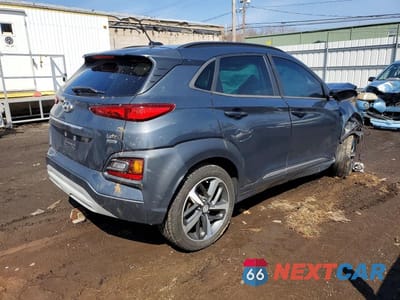 Trzecie zdjęcie samochodu z tyłu: 2018 HYUNDAI KONA LIMITED VIN:KM8K3CA55JU141339 - miniatura